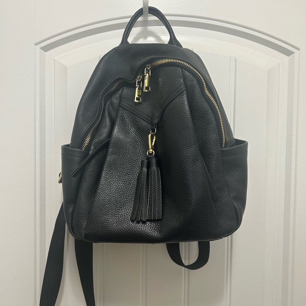 Elegant Black Backpack with Gold Details